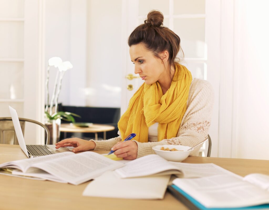 Young University Student Busy with Studying